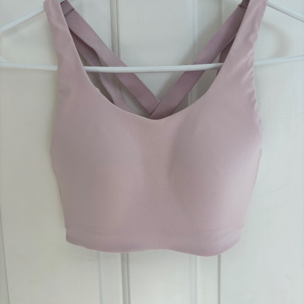Pink Lululemon sports bra